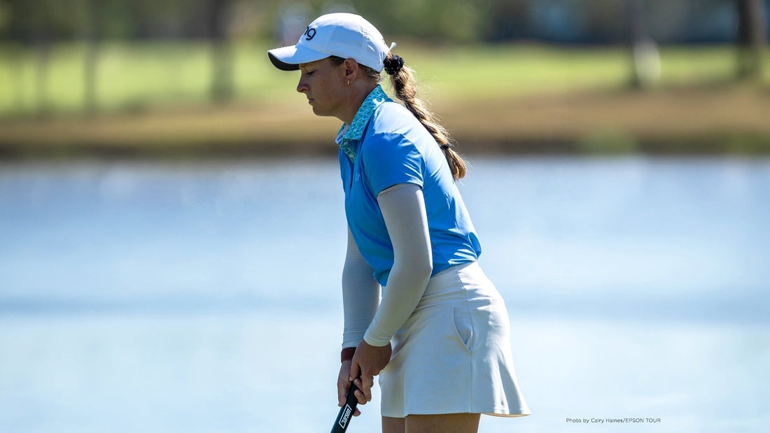Kaitlyn Papp Budde standing before a putt, eyes closed, hands on her Garsen ULTIMATE putter grip